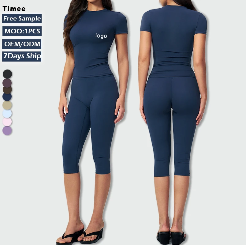 New Arrival Buttery Soft Breathable Lightweight Yoga Set Slim-Fit Short Sleeve Top Mid Waist Capri Leggings 2 Piece Outfit Women
