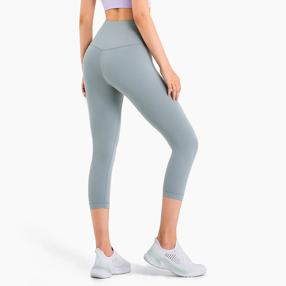 OEM Sportswear Custom Logo Hip Lift Fitness High Waist Yoga Pants Gym Butt Lift Yoga Compress Tights Seamless Cropped Trousers
