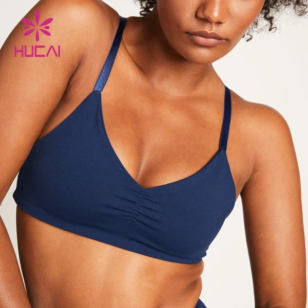 HUCAI OEM Fitness Wear Polyester Spandex Light Impact Ruched v Neck Cross Back Strappy Adjustable Sports Yoga Bra for Women