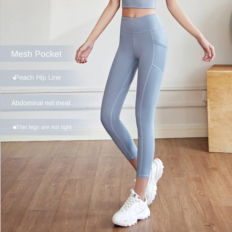Women's High Waist Hip-Lifting Yoga Pants with Mesh Side Pocket Stretch Sports Tight Fitness Clothes for Running Solid Pattern