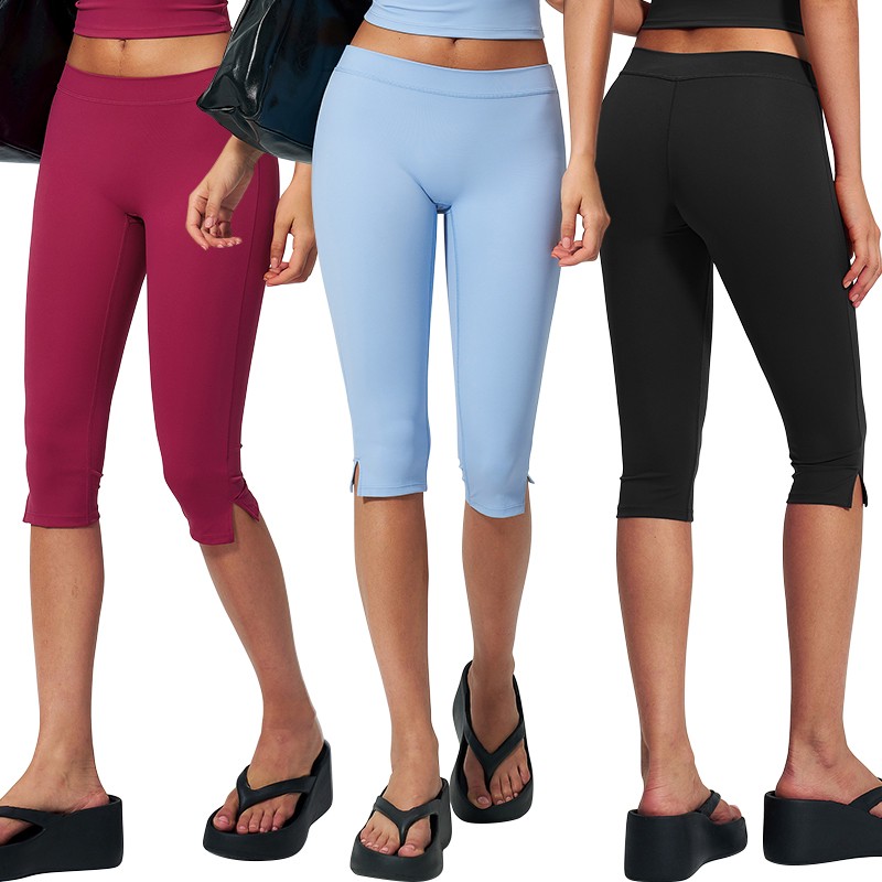 FZK3560 Women's Solid Color Low Waist Capri Pants Split Hem Yoga Gym Athletic Seven Inch Cropped Leggings