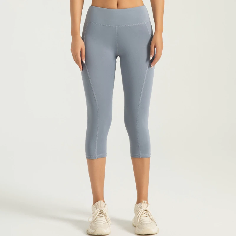 Women's High Waist Gym Sports Leggings Seven-Point Yoga Pants Side Pocket Peach Hip Lift Elastic Waist Seamless Print