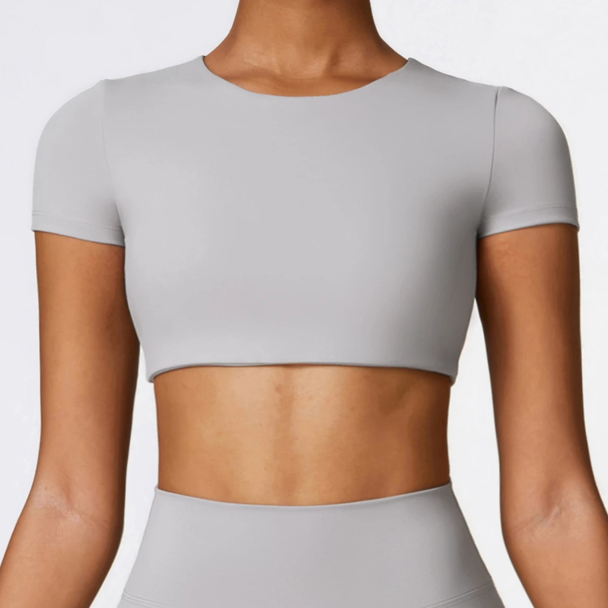 High Quality Wholesale Tight Yoga Top Breathable Quick-Drying Casual Sports T-Shirt Abrasion Fitness Clothing with Short Sleeves