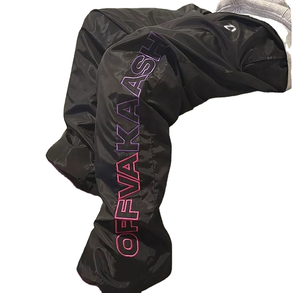 Men Oversized Graphic Nylon Pants Wide Leg Streetwear Trousers Bold Side Text Casual Track Pants OEM Production