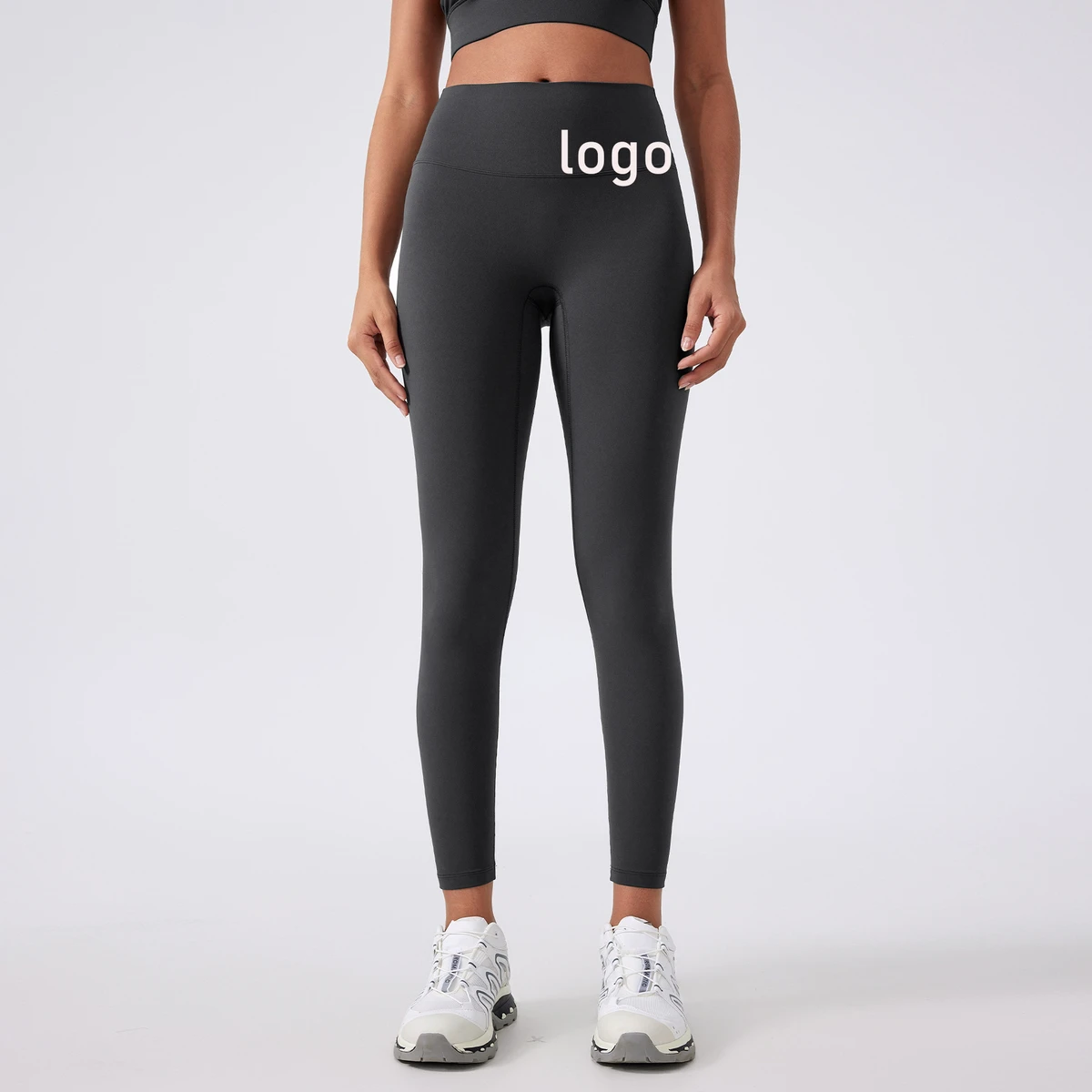 Women's High Waist Yoga Leggings Solid Pattern Fitness Pants with Elastic Breathable Hip Tight for Running Custom Logo Wholesale