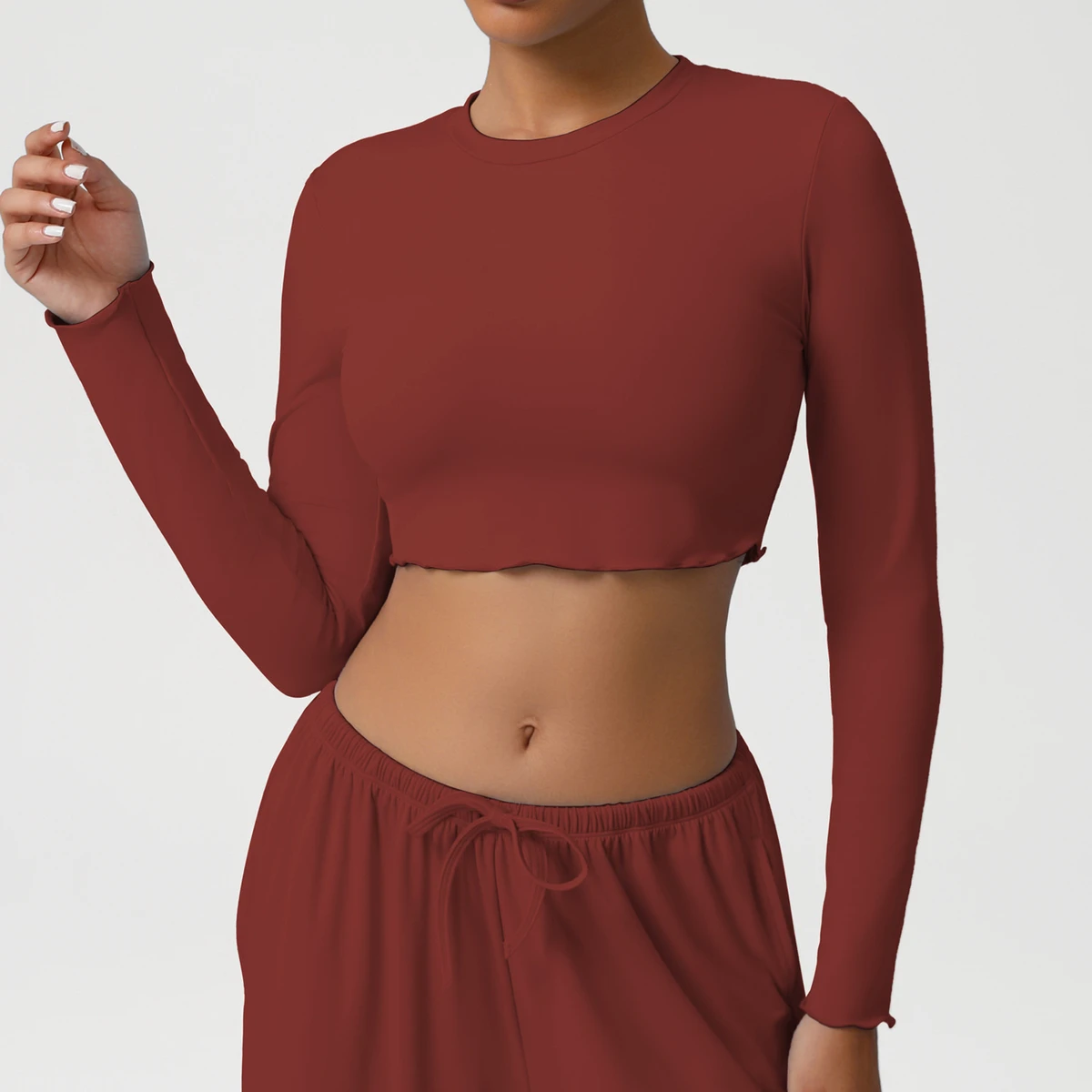 2026 OEM ODM Custom Logo Women's Round Neck Long Sleeve Cropped Top Ruffle Hem Skin-friendly Yoga Workout Athletic Casual Top
