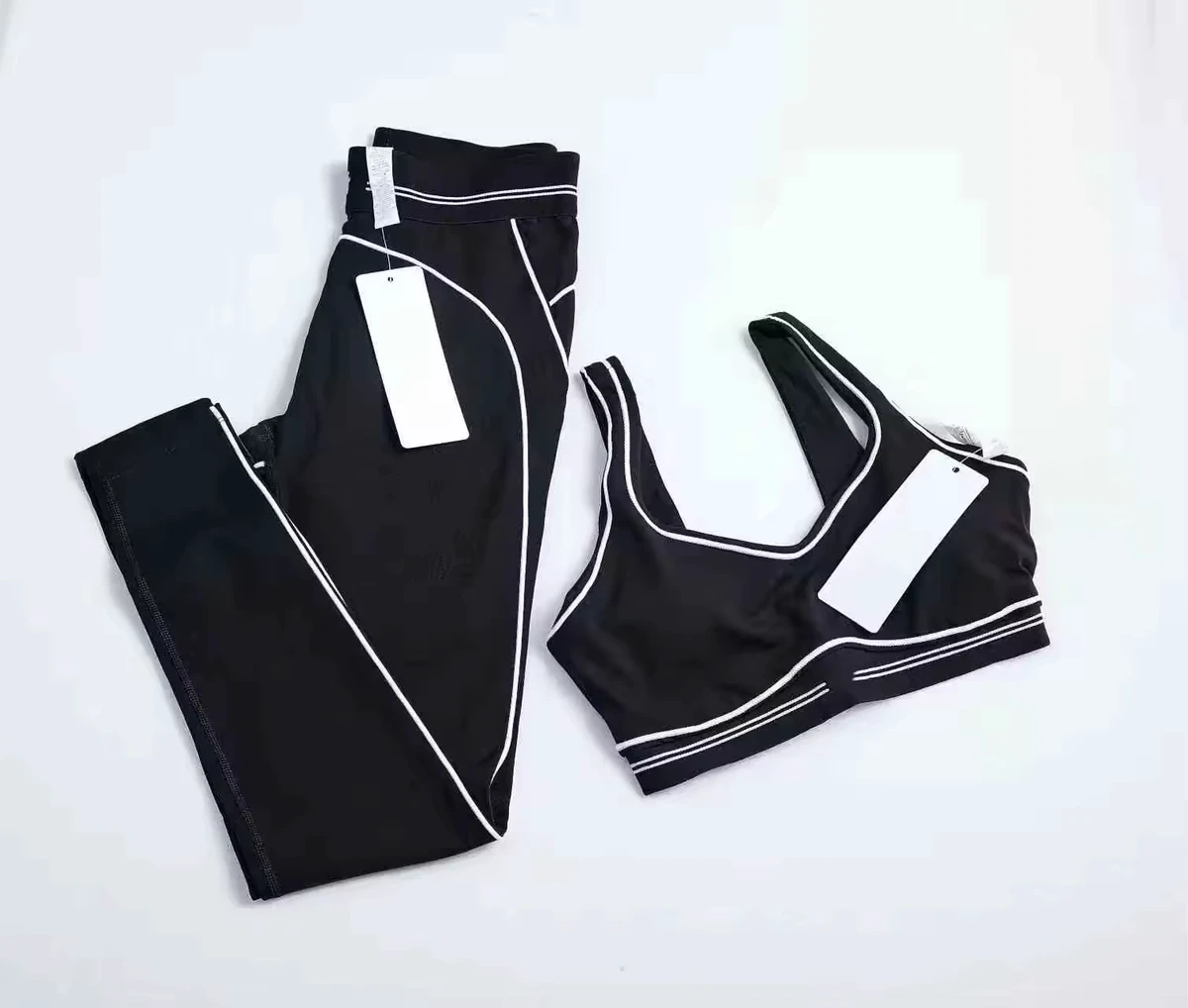 Wholesale Solid Breathable Fashion Yoga Pilates Stretch Seamless Ribbed High-quality Leggings 2 Piece Set Front Logo for Women