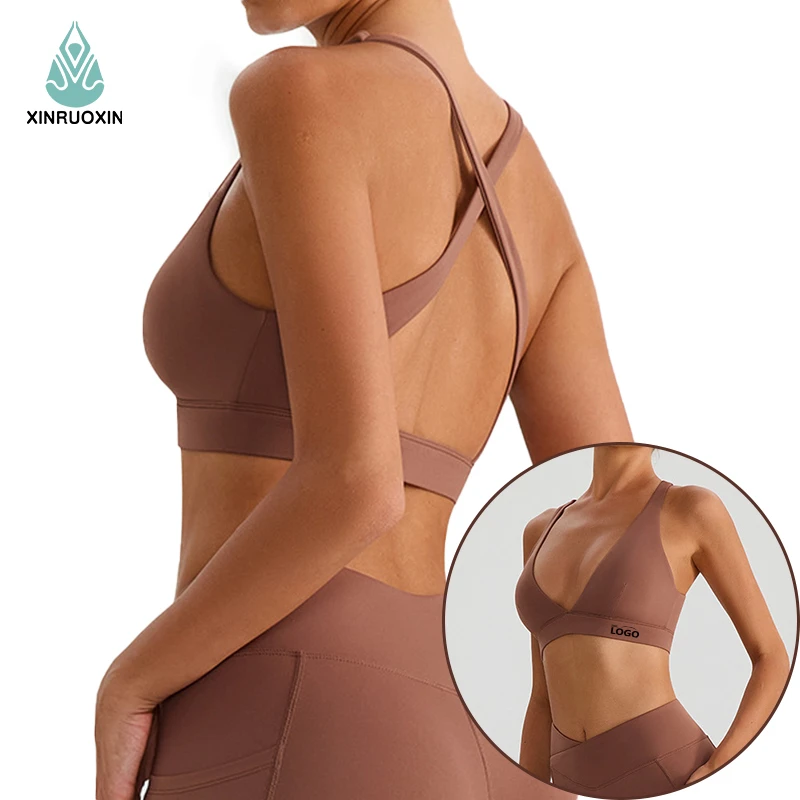 Hot-selling Lightweight Deep V Outer Nude Yoga Sports Bra with Front Logo Fashion Cross Beautiful Back Shockproof Gathering