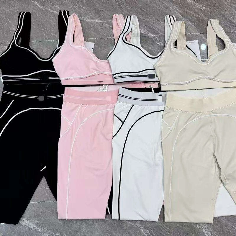 Factory Direct Sell Fashion Yoga Pilates Stretch Seamless Ribbed High-quality Leggings Yoga 2 Piece Set for Women