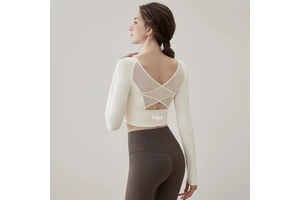 OEM Nude-feel Skinny Fit Breathable Quick-Dry Spandex/Nylon Yoga Top with Built-In Chest Pads Long-Sleeved for Women Pilates